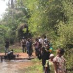 Visite à la source thermale du village de Dokomé